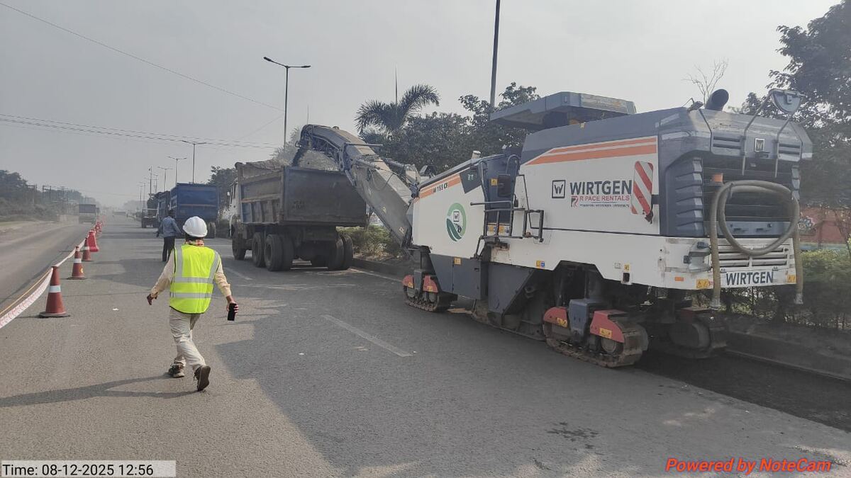 Wirtgen cold milling machine removing the existing surface, NH-2