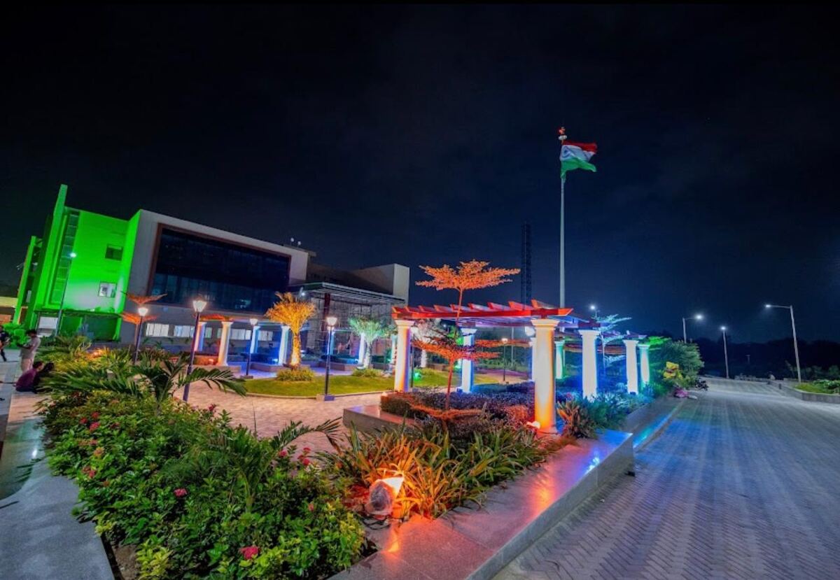 Completed control centre building and landscaped forecourt lit at night