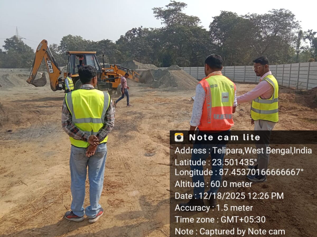 Site engineers supervising excavation work at the project stockyard